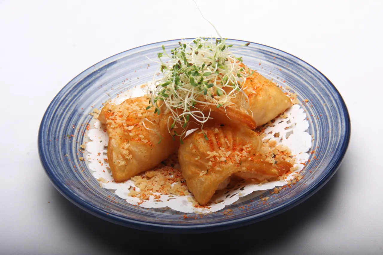 Golden pan-fried dumplings at Neptune Palace